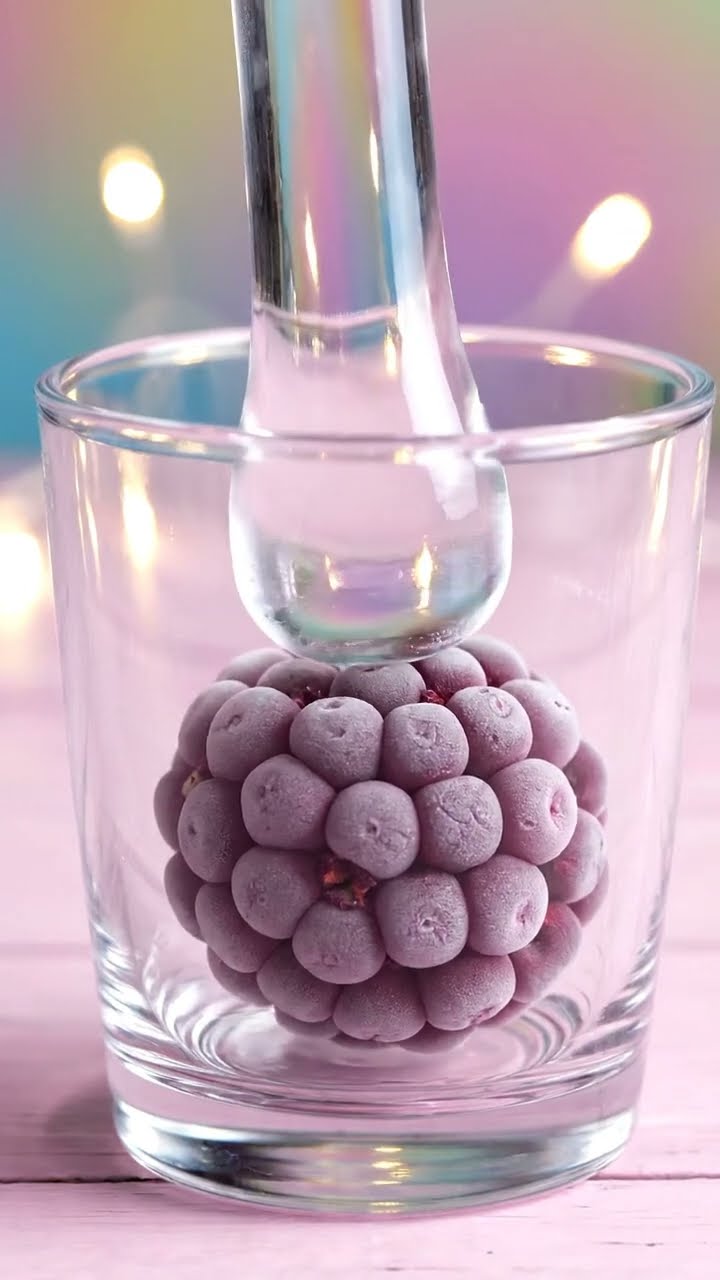AI-generated ASMR video frame: Frozen marionberry