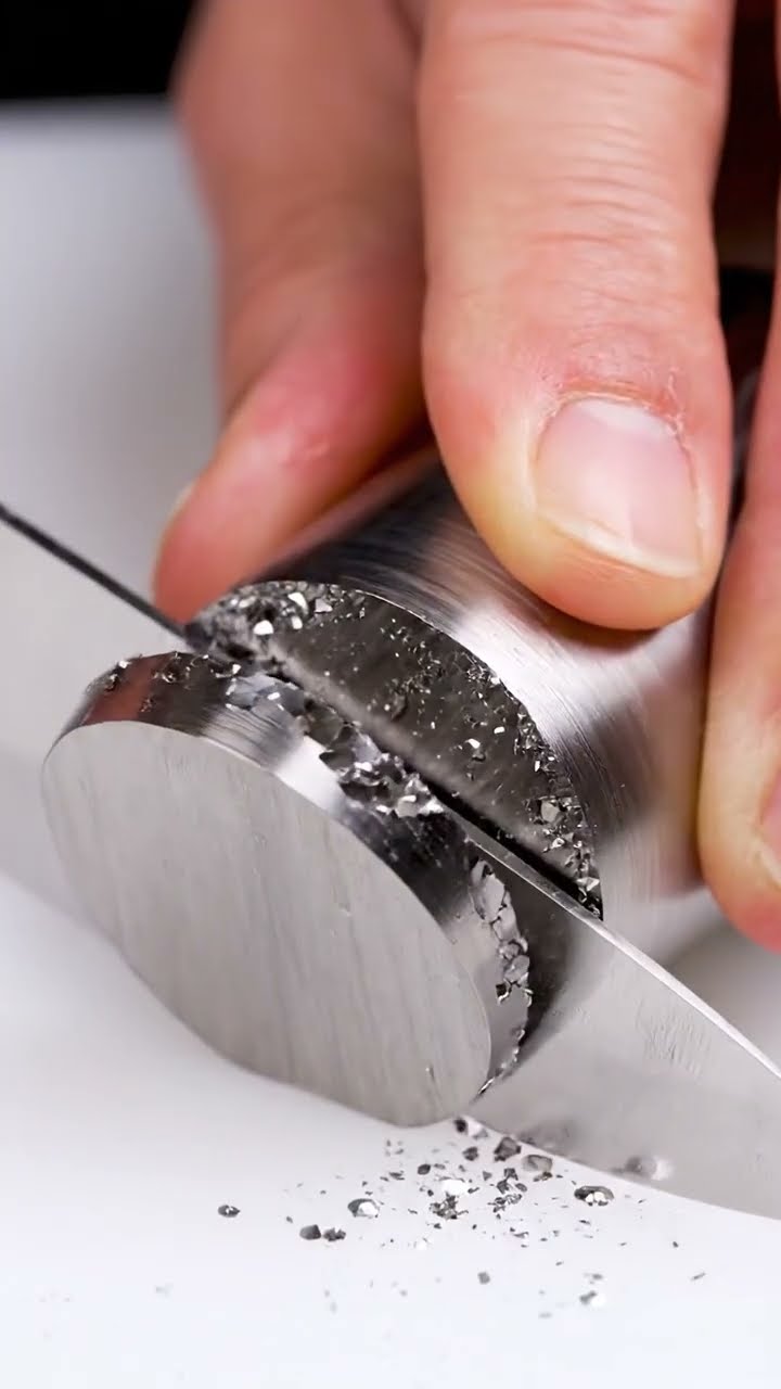 AI-generated ASMR video frame: Polished metal beryl